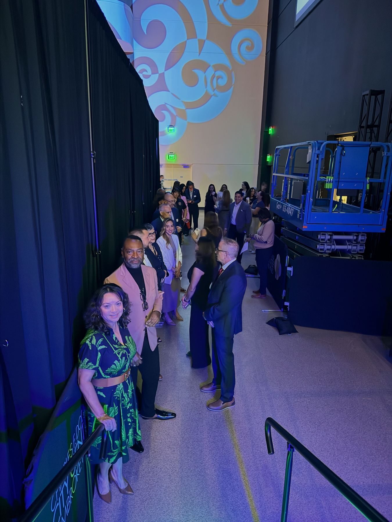 Award recognition photo on stage during the summit