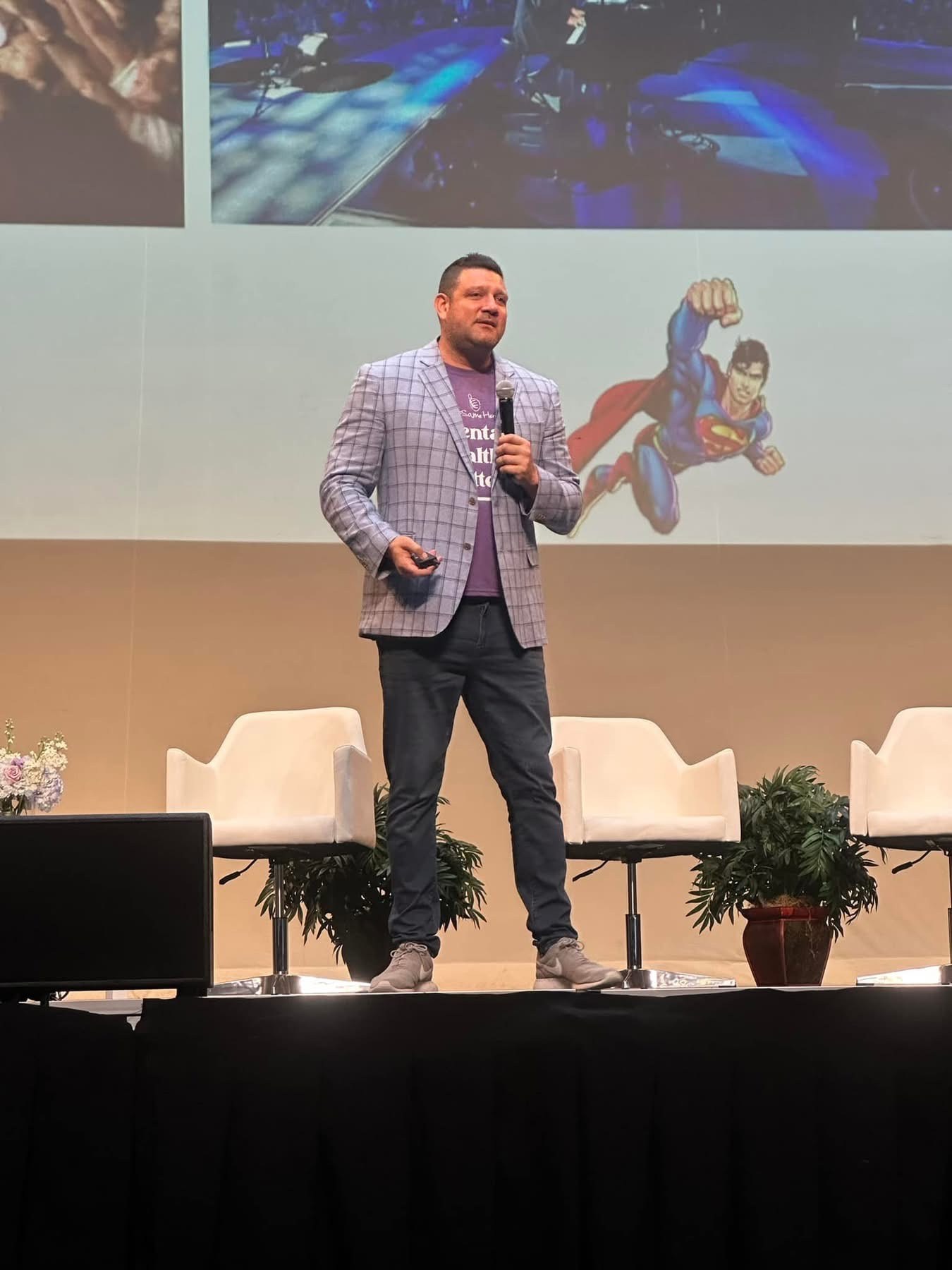 Keynote speaker presenting on stage